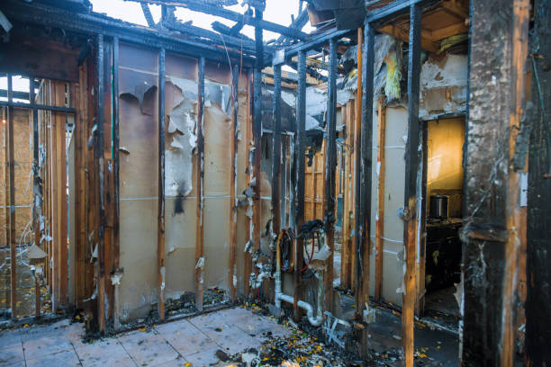 Professional Fire Damage Restoration technician working in Santa Clara, NM